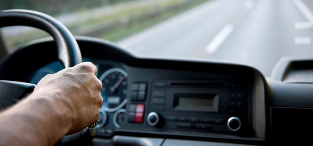 Commercial truck driver behind the wheel - DOT physical exams in Cuyahoga Falls Ohio